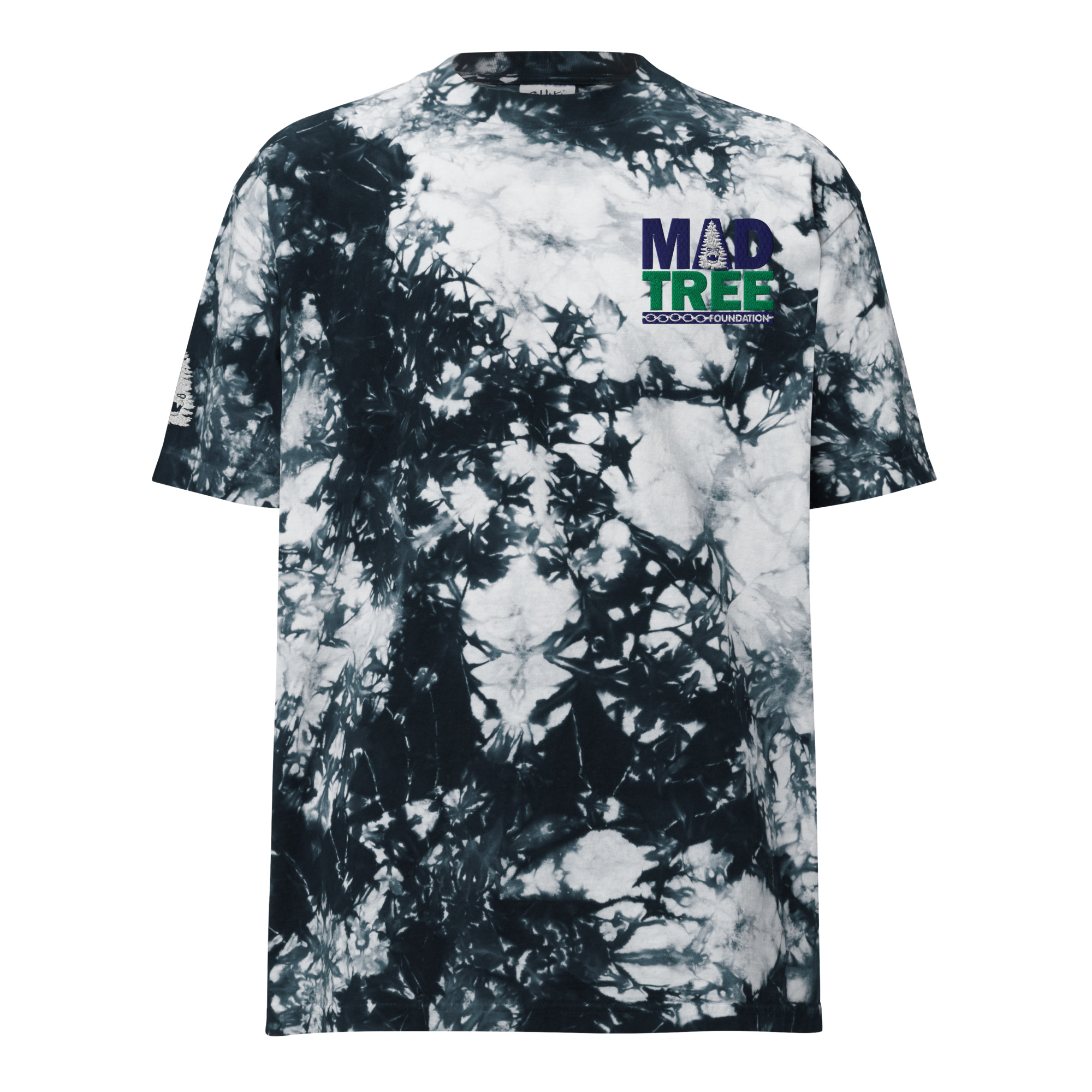 The Oversized tie-dye t-shirt features a black and white pattern with "MAD TREE" in bold purple and green text on the upper left chest. It has short sleeves and a relaxed, comfortable fit.