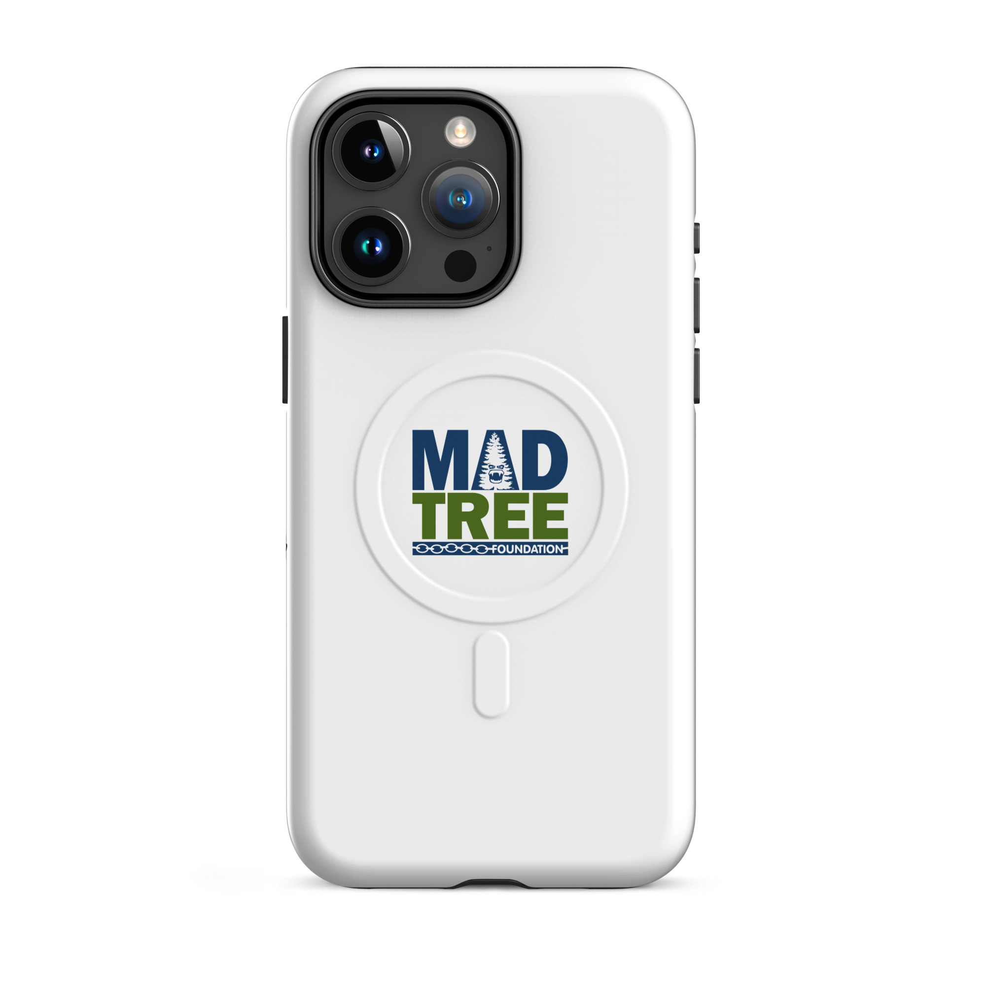 The MagSafe® tough case for iPhone® - Mad Tree is a white smartphone case featuring a circular attachment with the MAD TREE Foundation logo in blue and green text and a tree graphic inside the letter A.