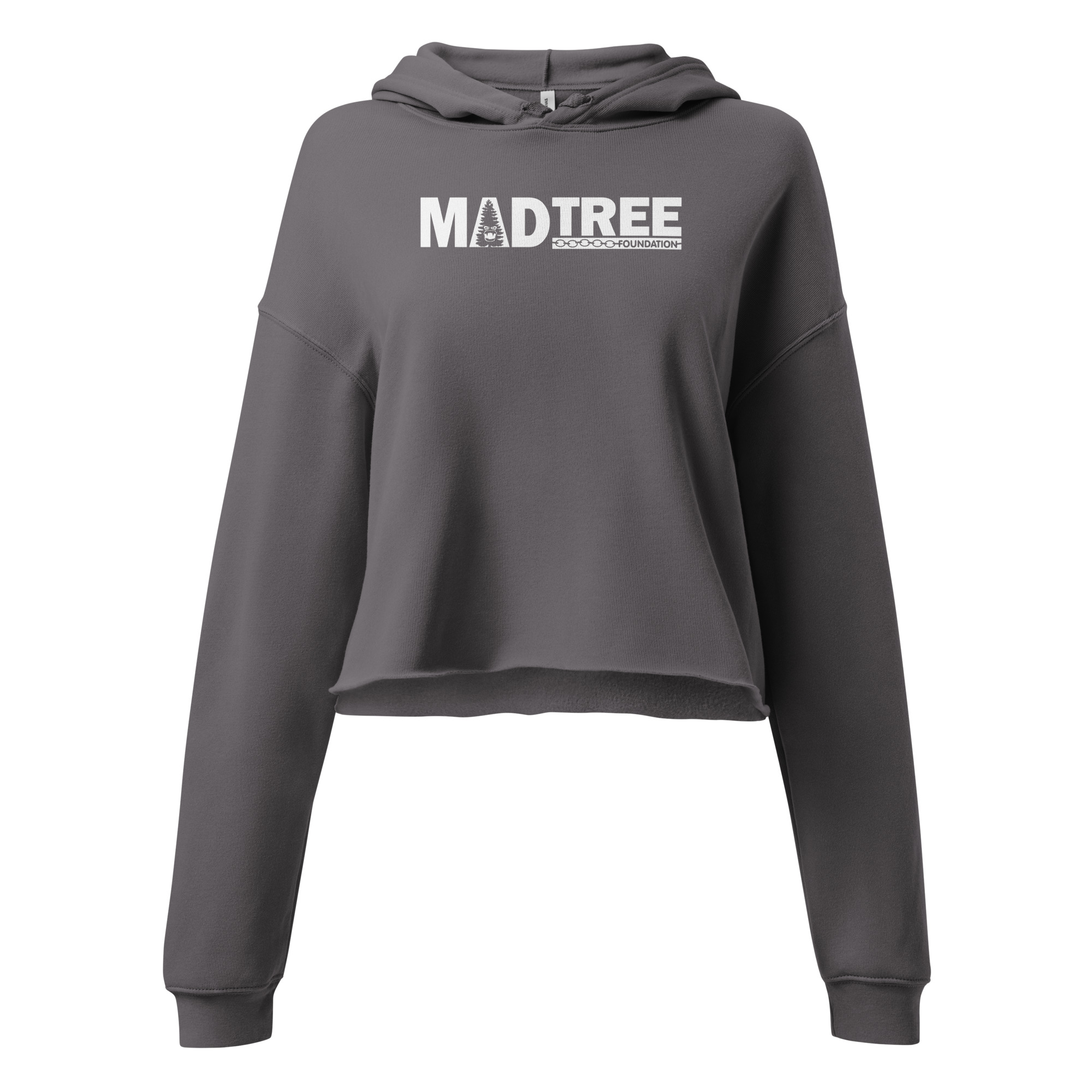 The Crop Hoodie - Mad Tree is a charcoal gray, long-sleeve cropped hoodie with a hood, featuring white "MAD TREE" text and a tree graphic on the front.